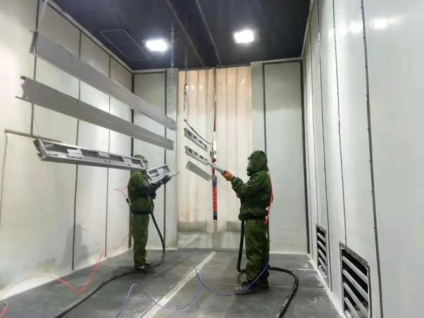 How do you maintain an eco-friendly sandblasting room for peak performance and longevity?
